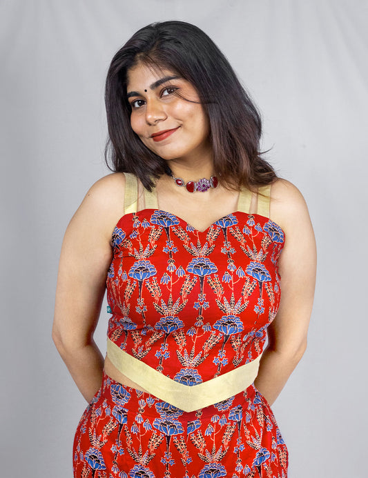 Scarlet – Cotton Ajrakh printed top with a golden Kerala kasavu border